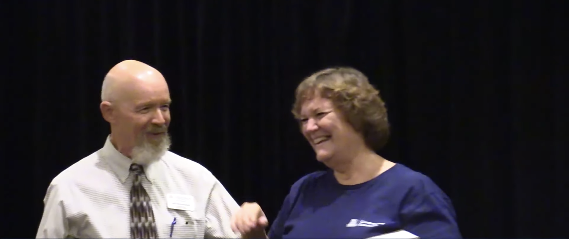 Associate Dean Jeffrey Silvertooth presenting an award to a Cooperative Extension employee