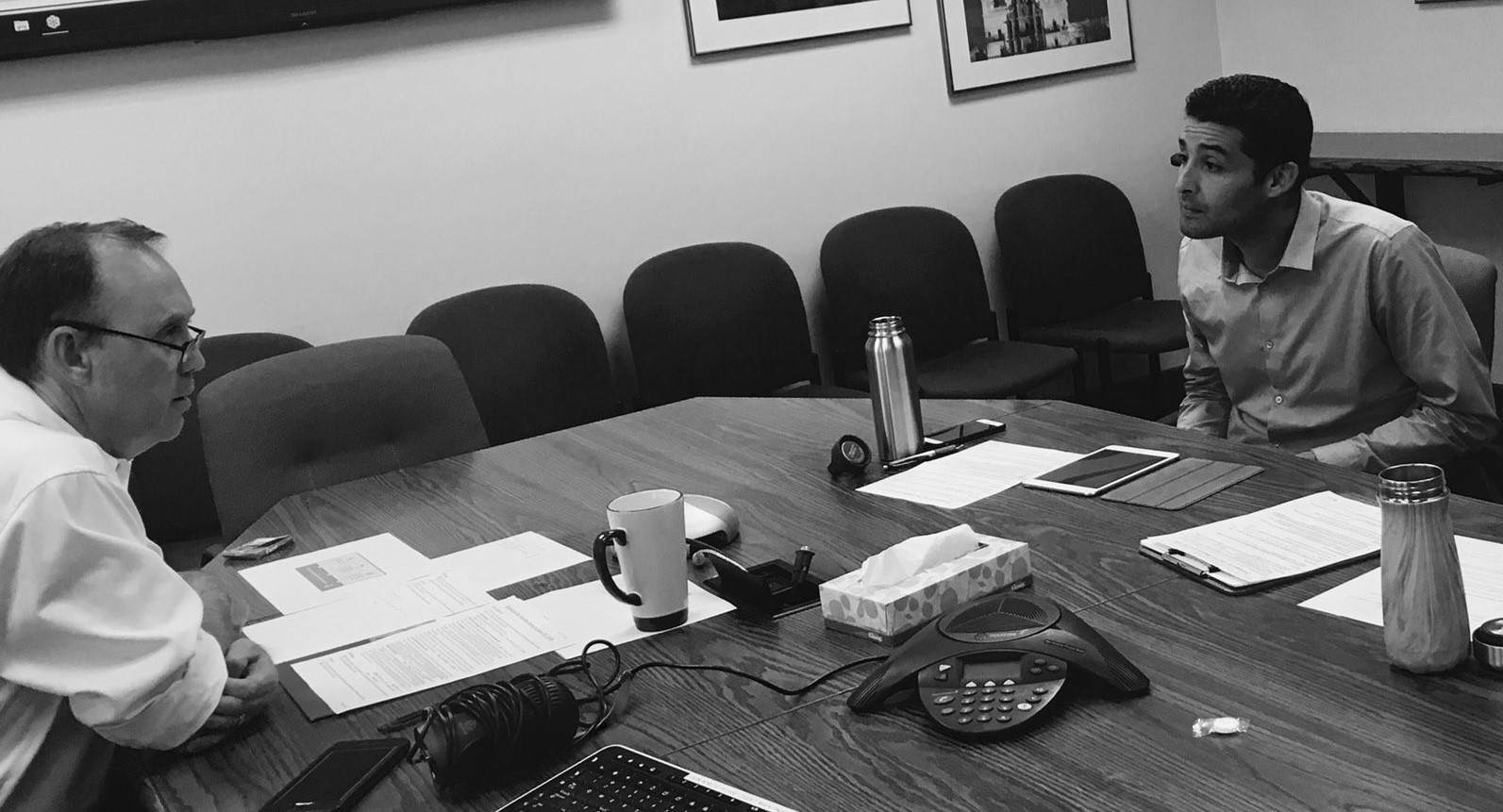 College dean interviewing staff for webinar program