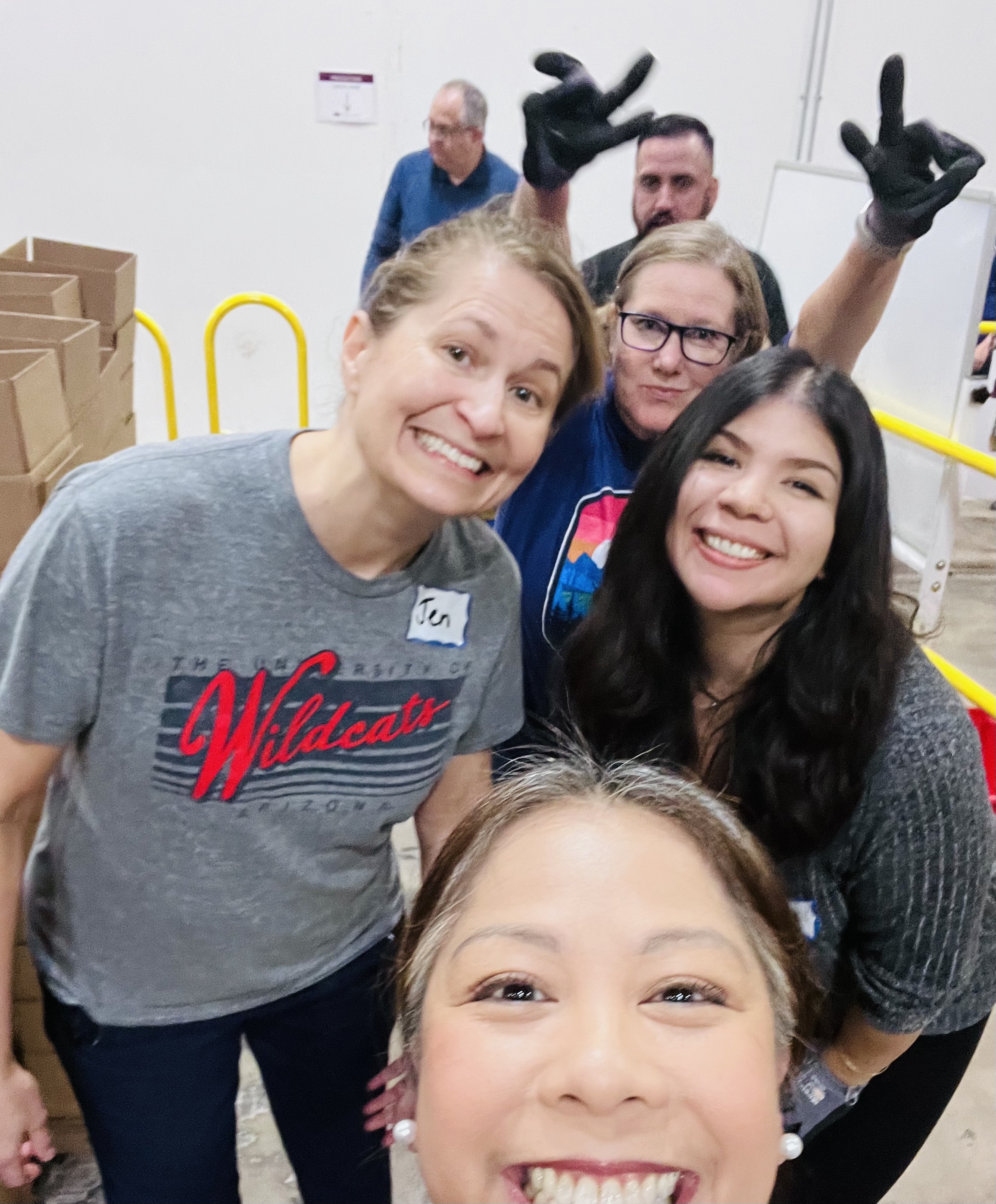 women volunteering at community food bank