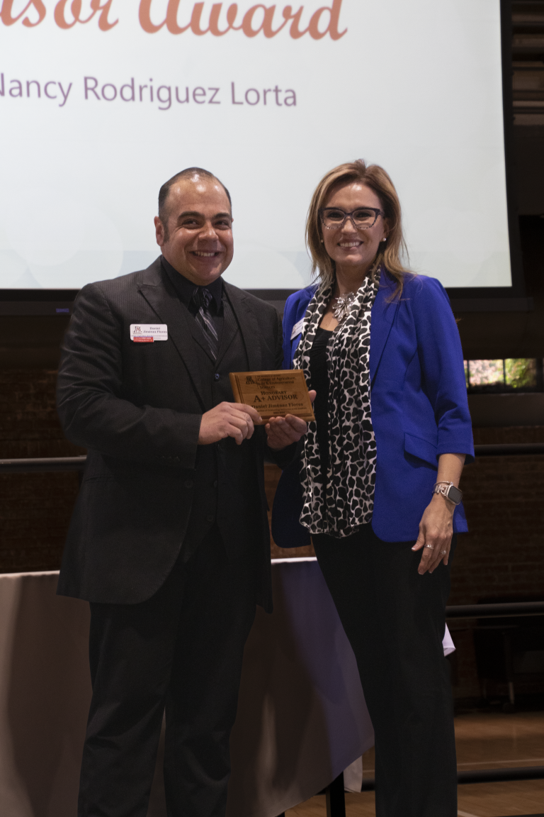 A+ Advisor Award recipient Daniel Jiménez Flores with award presenter.