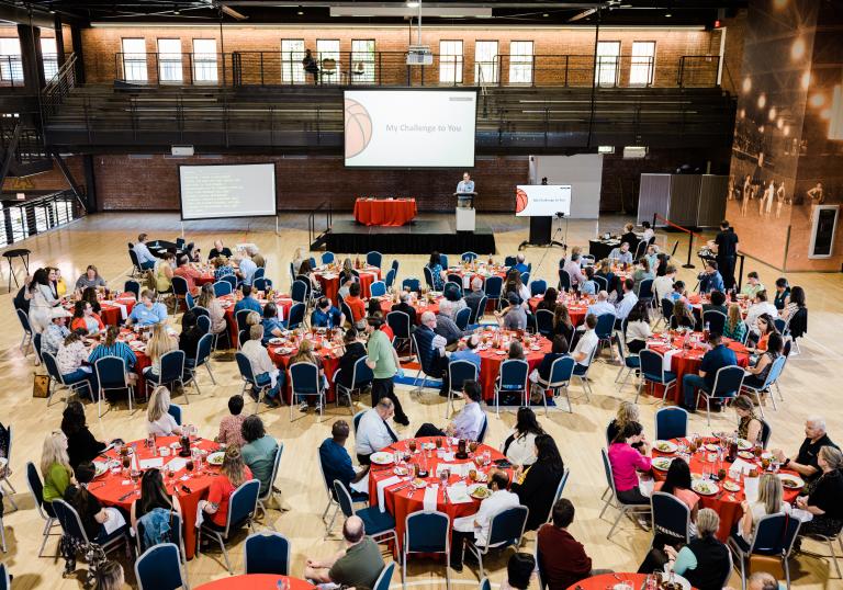 Overhead view of awards banquet tables with guests