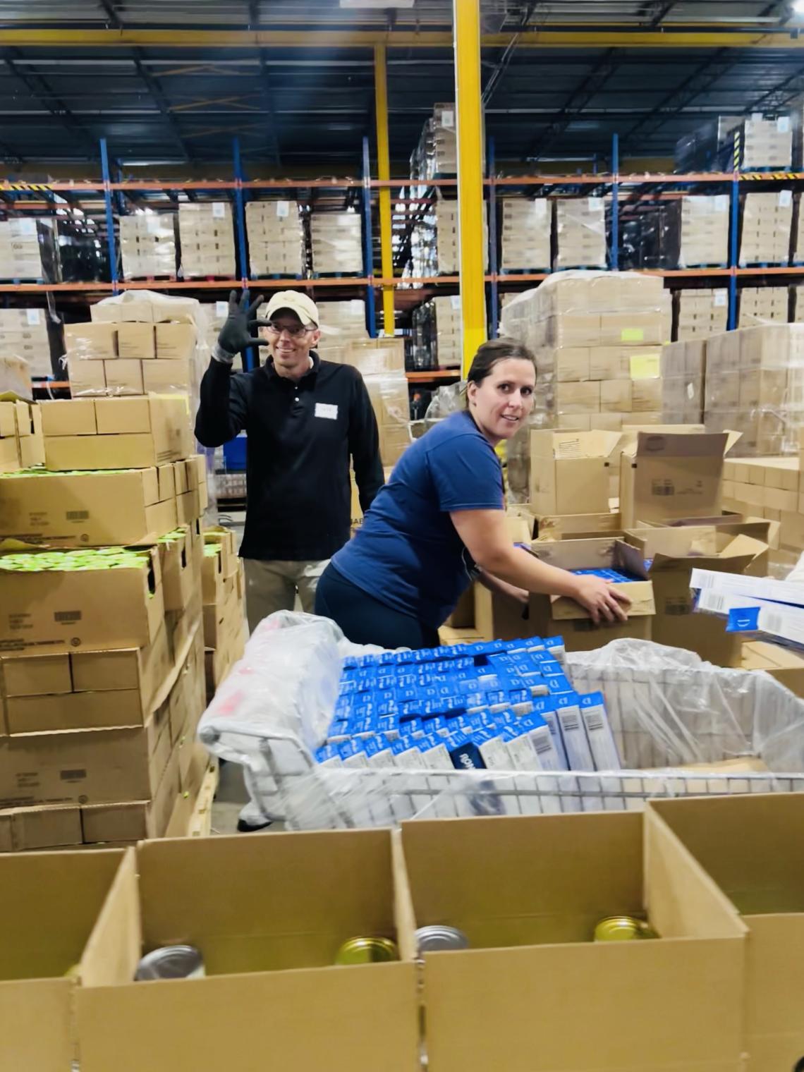 people volunteer at food bank